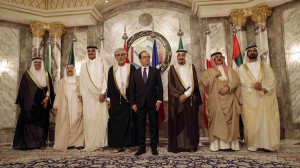 French President Francois Hollande poses for a family photo before the opening of the Gulf cooperation council summit in Riyadh, Saudi Arabia